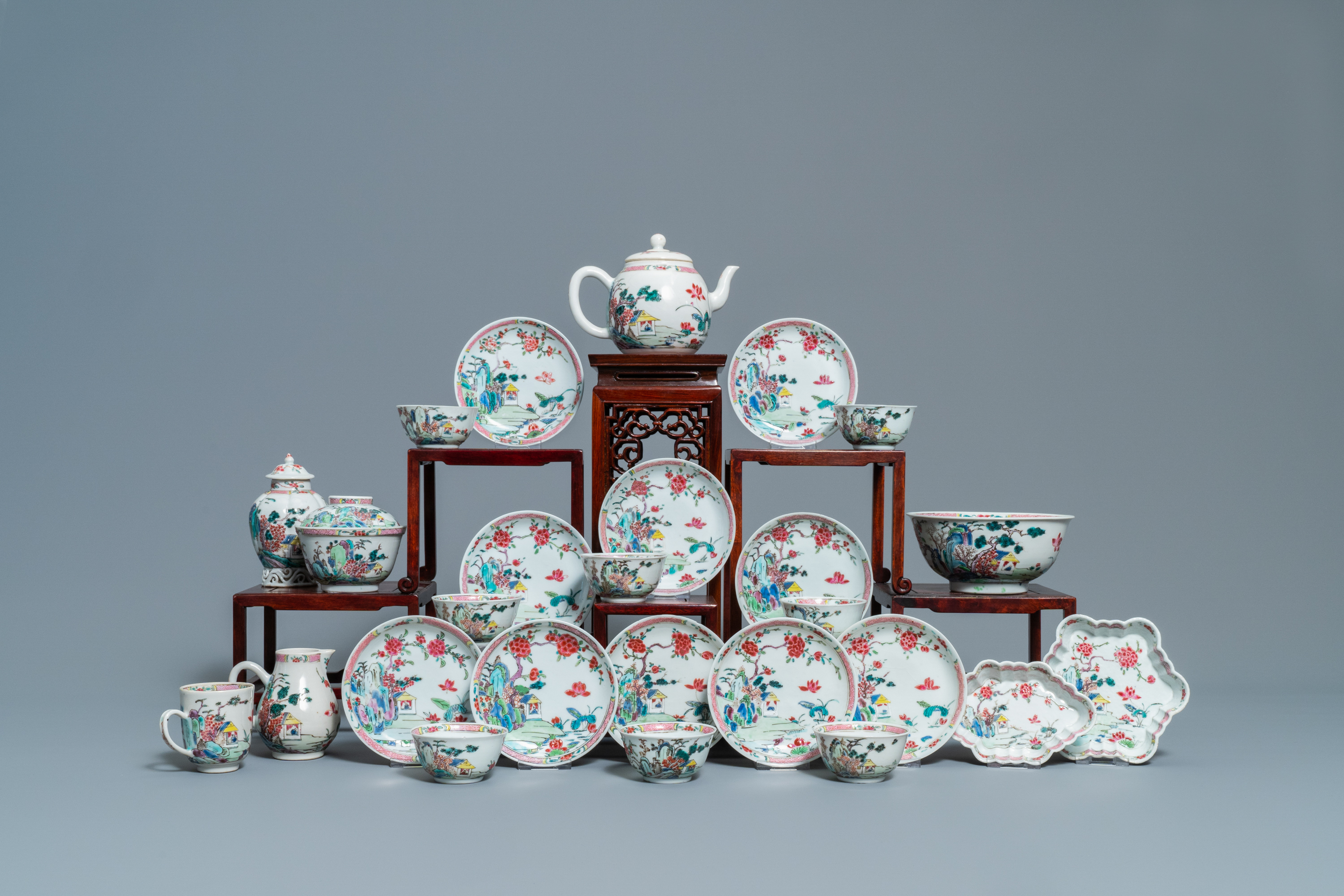 A Chinese famille rose 27-piece tea service with landscape design, Yongzheng/Qianlong