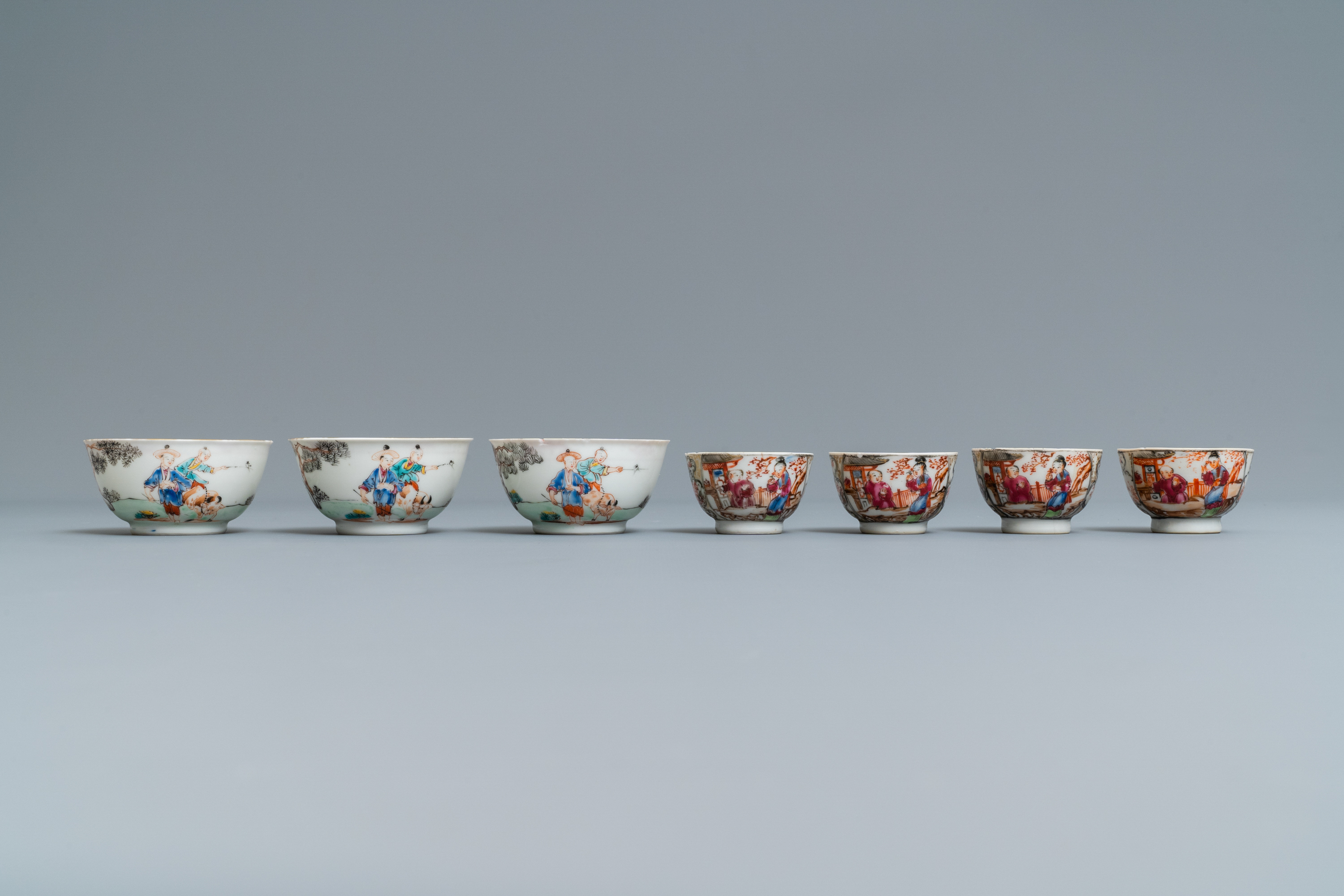 Seven Chinese famille rose 'Mandarin' cups and saucers, Qianlong - Image 6 of 9