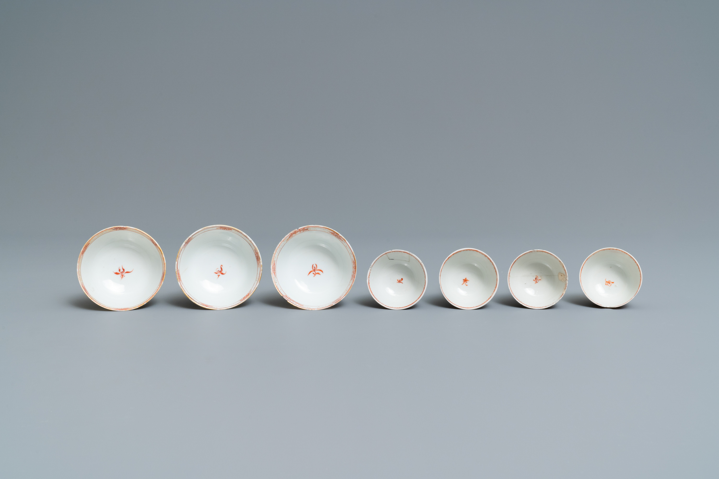 Seven Chinese famille rose 'Mandarin' cups and saucers, Qianlong - Image 8 of 9