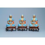 Three Chinese enamelled and gilt figures of Bodhisattva, Qianlong/Jiaqing