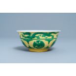 An imperial Chinese green & yellow enamelled 'dragon and phoenix' bowl, Kangxi mark & of the period