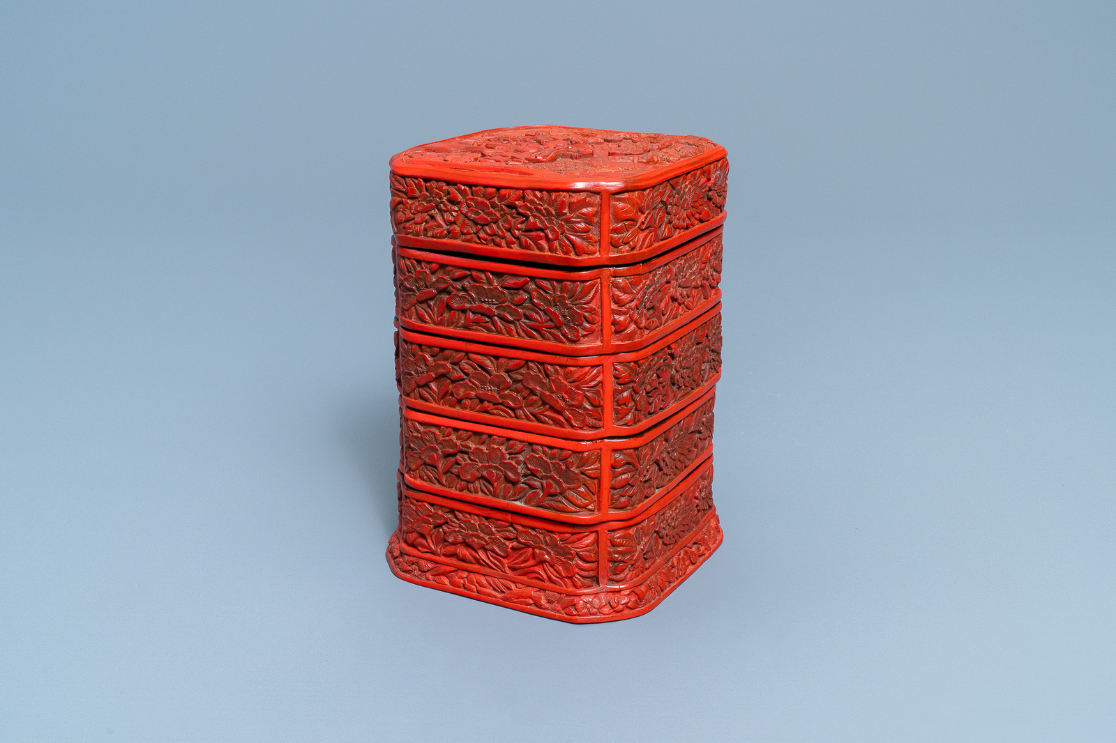 A Chinese red cinnabar lacquer four-tiered box, Wanli - Image 9 of 9
