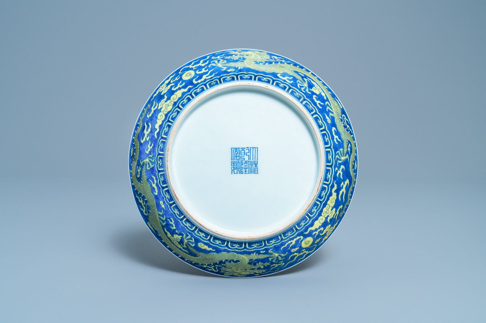 A Chinese underglaze blue and yellow-glazed 'dragon' dish, Qianlong mark and of the period - Image 2 of 2