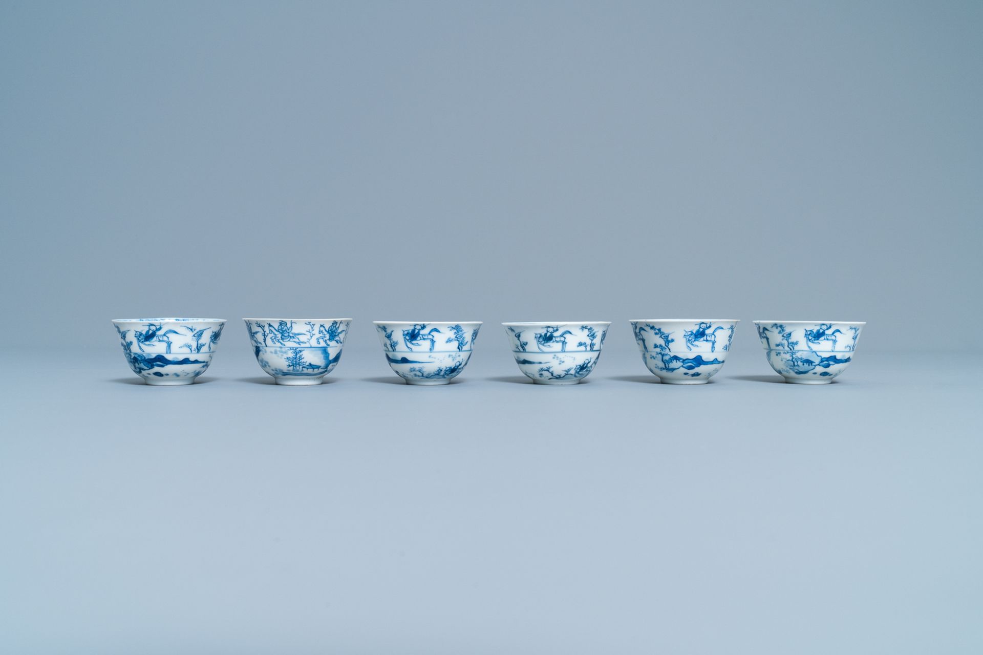 Six Chinese blue and white cups and saucers with horseriders, Kangxi - Image 5 of 10