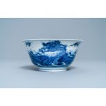 A Chinese blue and white 'dragon and carps' bowl, Xuande mark, Kangxi