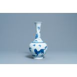 A rare Chinese blue and white bottle vase with a tiger and two butterflies, Transitional period