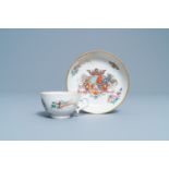 A Chinese famille rose Dutch market cup and saucer with the arms of Van Scholten en Wesele, Qianlong