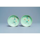 A pair of Chinese famille rose lime green-ground sgraffiato saucer dishes, Qianlong mark and of the