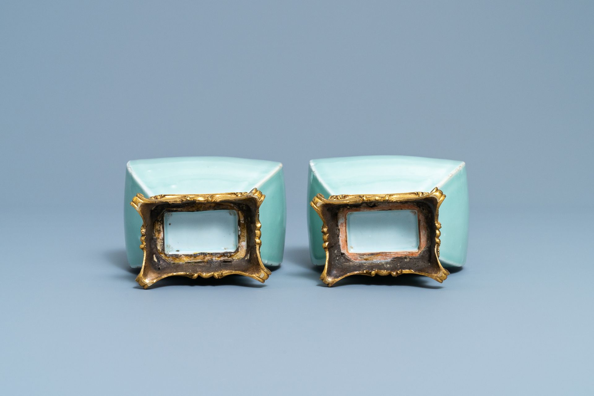 A pair of Chinese monochrome celadon vases with gilt bronze mounts, 18/19th C. - Image 7 of 7