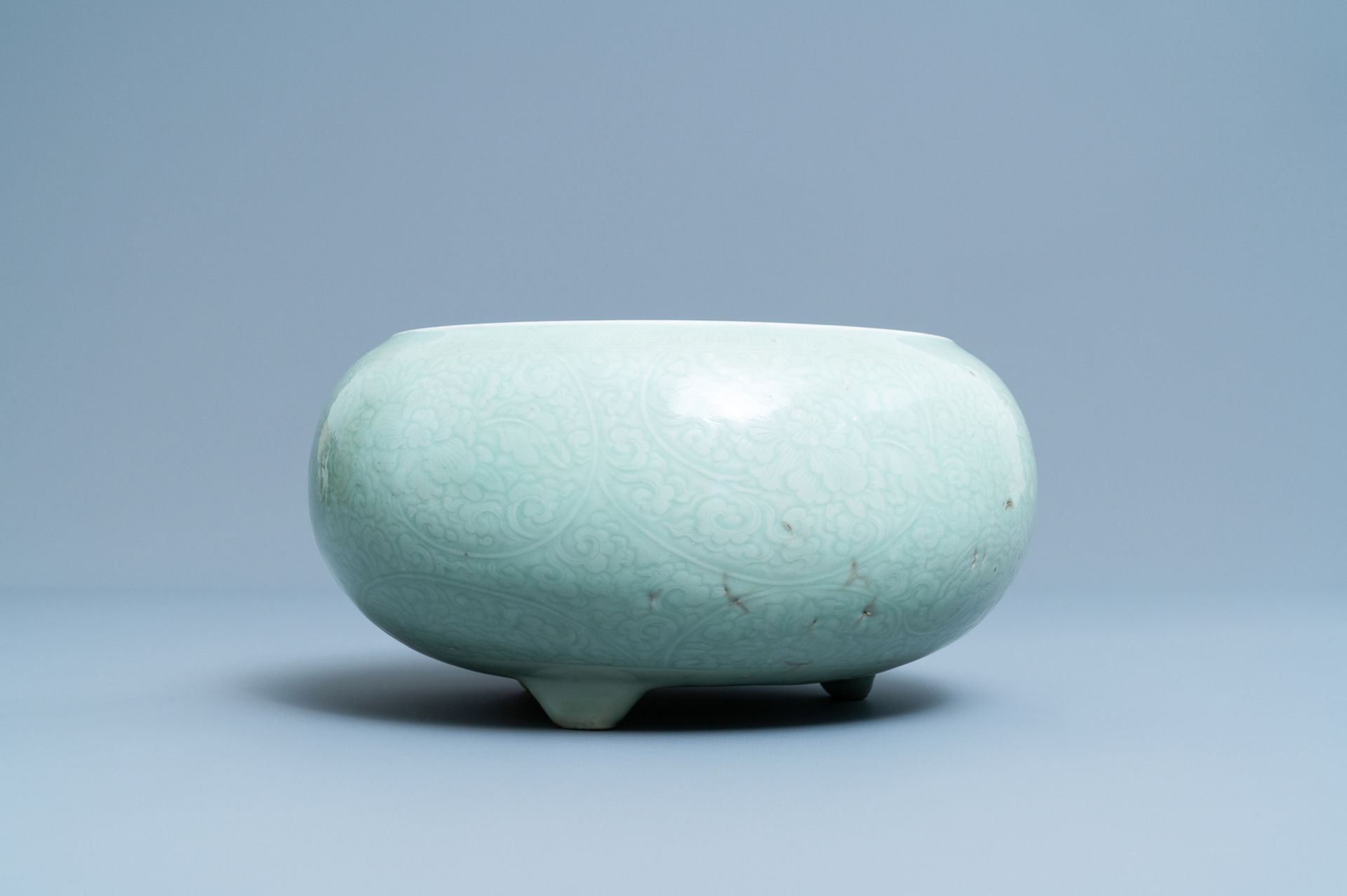 A Chinese celadon-glazed tripod censer with incised underglaze design, Kangxi - Image 4 of 7