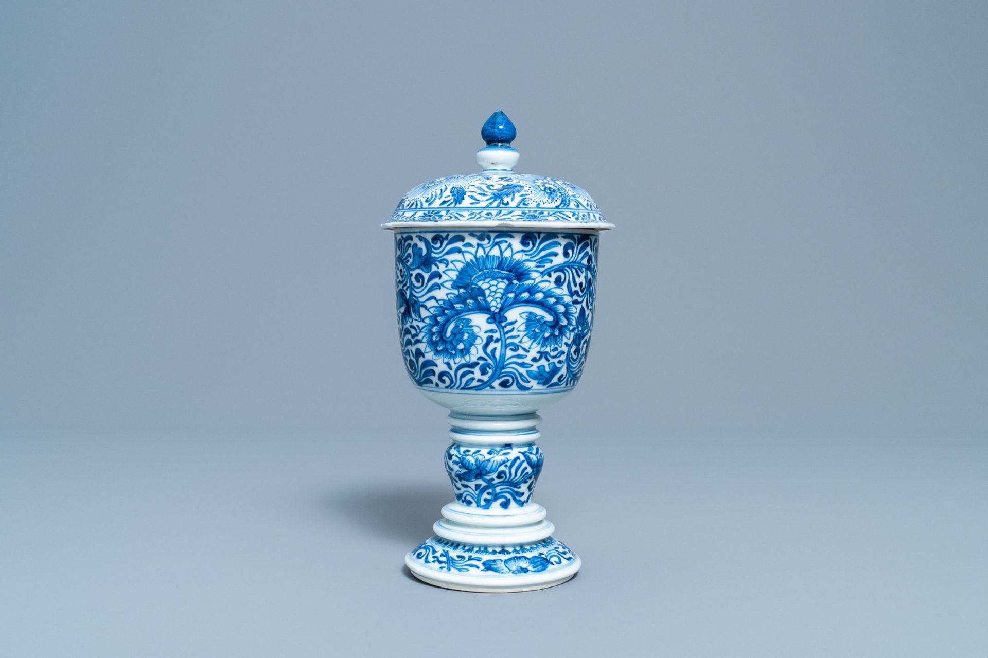 A Chinese blue and white beaker and cover with floral design, Kangxi - Image 3 of 6
