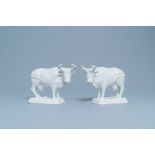 A pair of white Dutch Delftware cows on bases, 18th C.