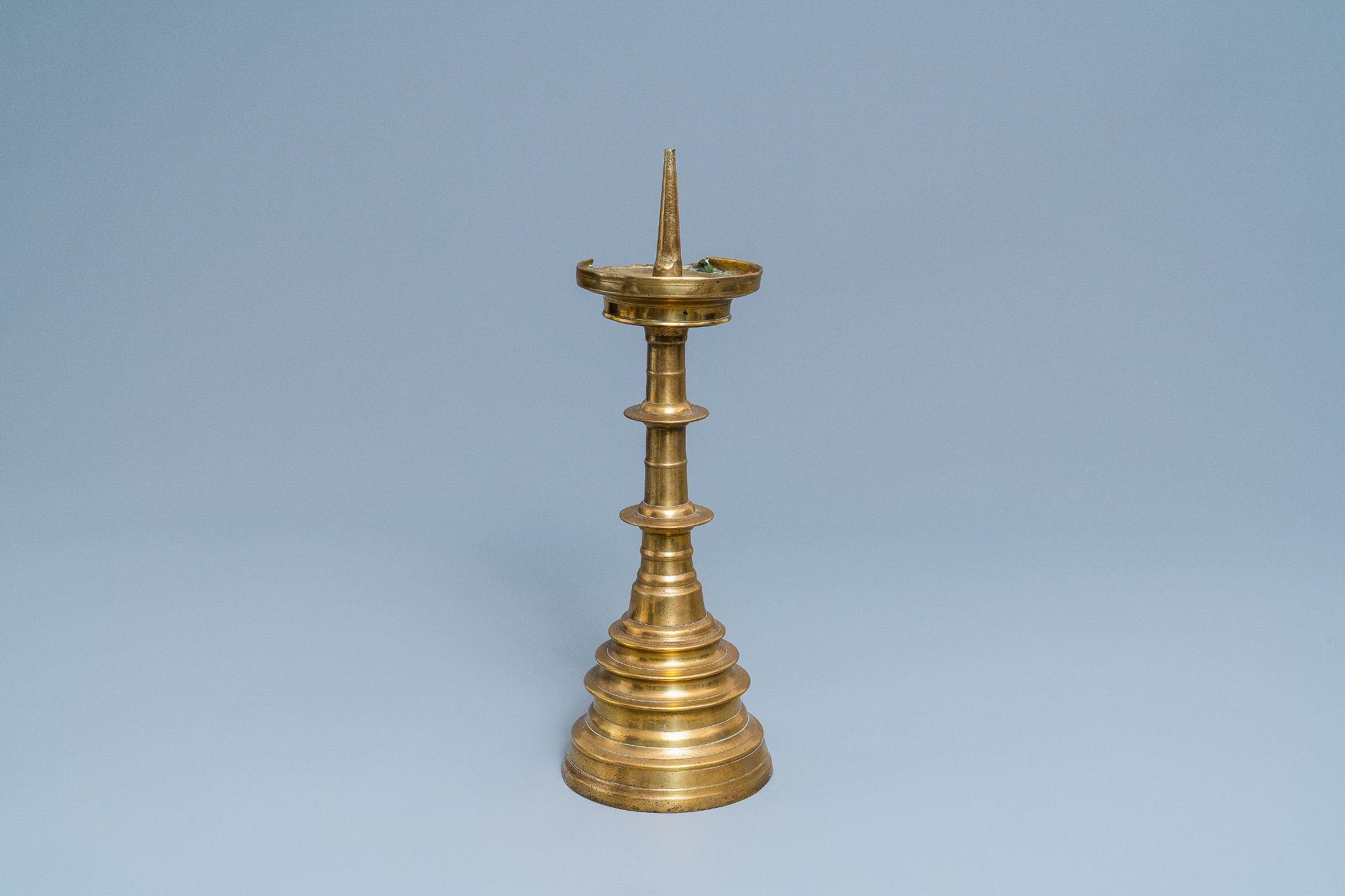 A large Flemish bronze candlestick, 16th C.