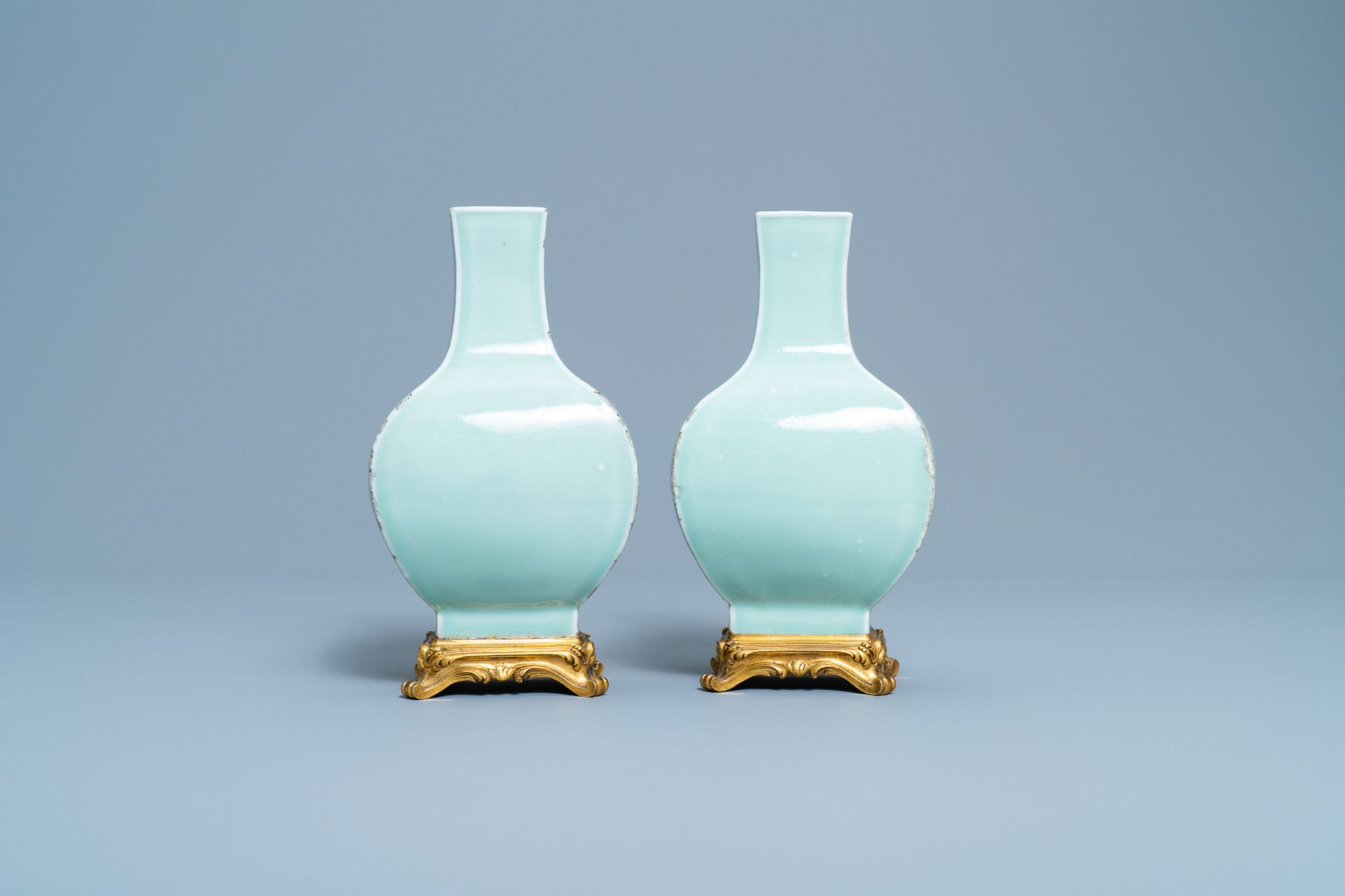 A pair of Chinese monochrome celadon vases with gilt bronze mounts, 18/19th C. - Image 2 of 7