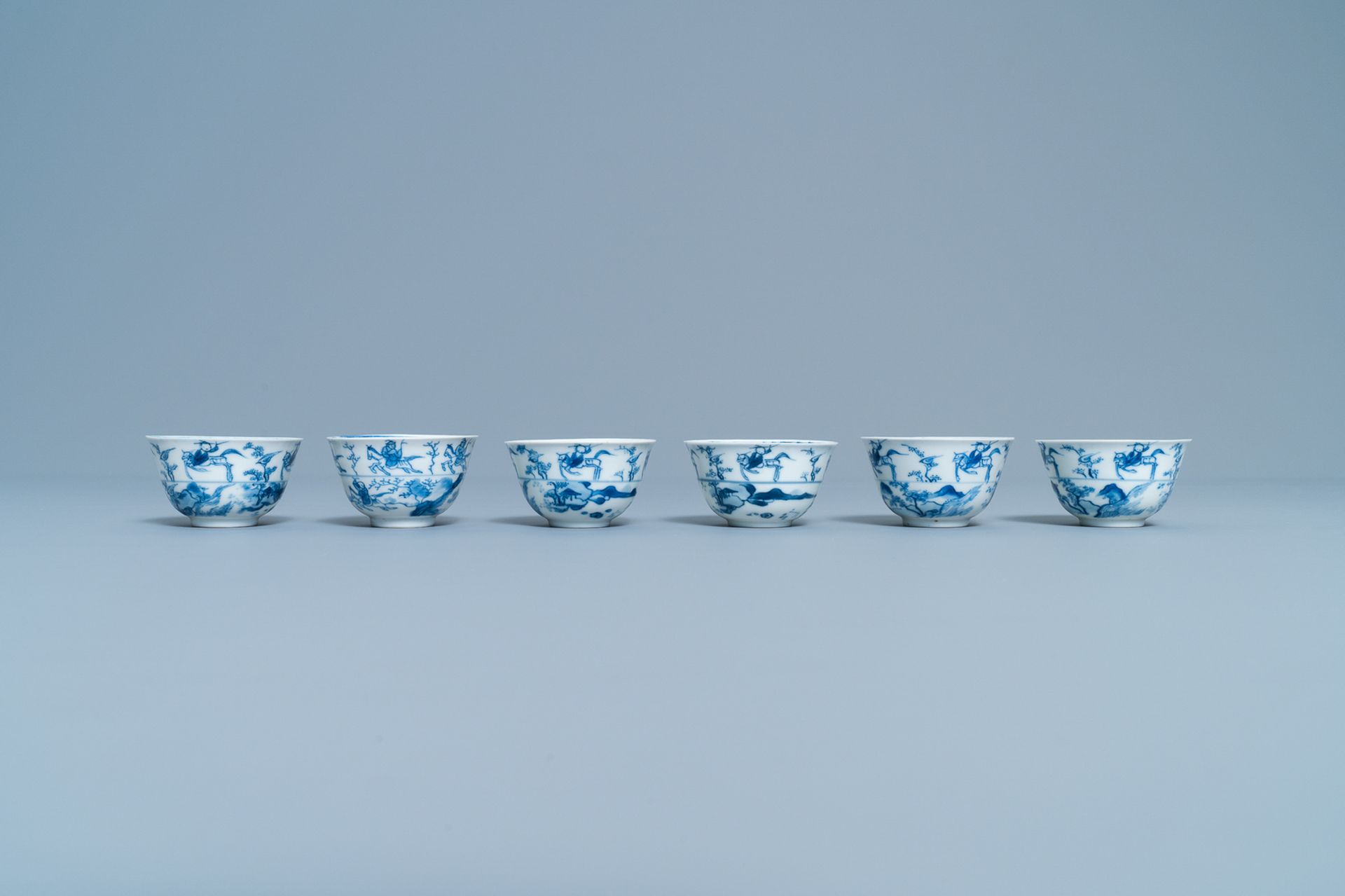 Six Chinese blue and white cups and saucers with horseriders, Kangxi - Image 7 of 10