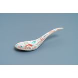 A large Chinese famille rose relief-moulded spoon, Daoguang mark and of the period