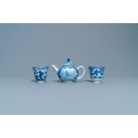 A Chinese blue and white teapot and a pair of wine cups, Kangxi