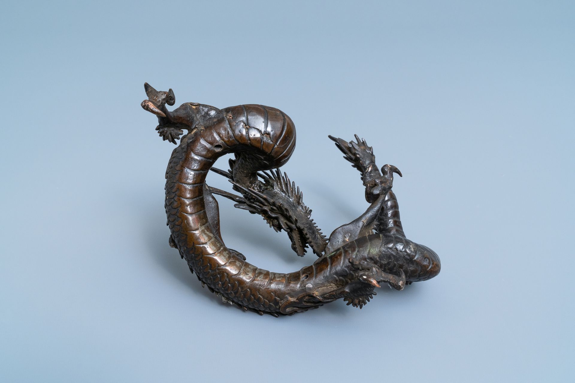 A Japanese bronze model of a dragon, Meiji, 19th C. - Image 7 of 7