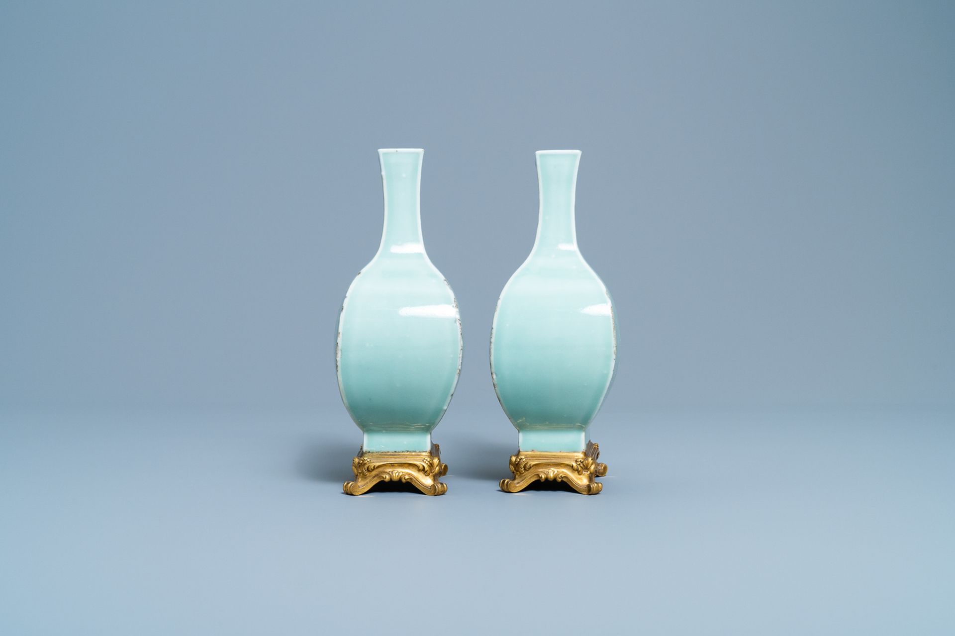 A pair of Chinese monochrome celadon vases with gilt bronze mounts, 18/19th C. - Image 5 of 7