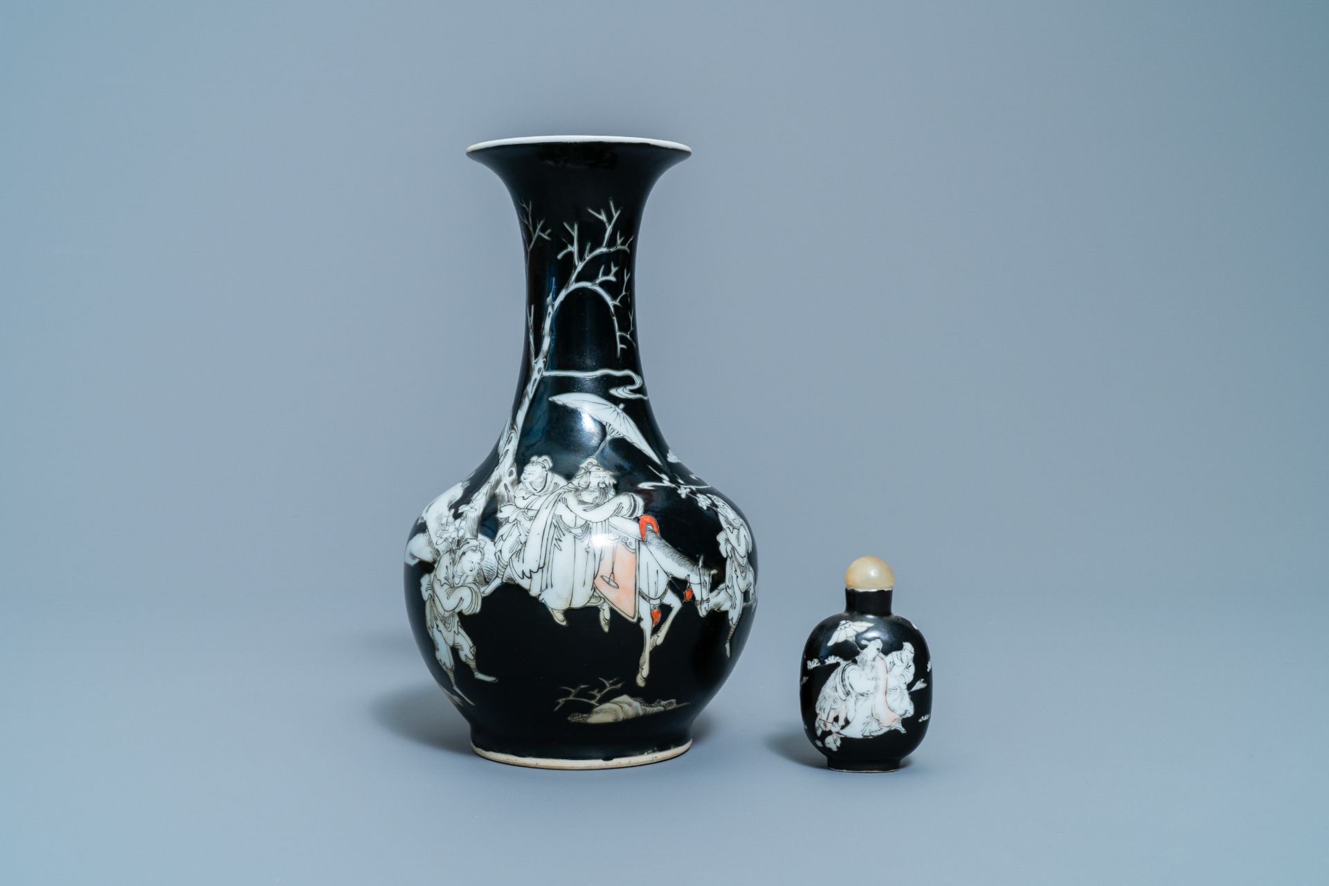 A Chinese black-ground grisaille and iron red vase and a snuff bottle, 18th C. - Image 2 of 14