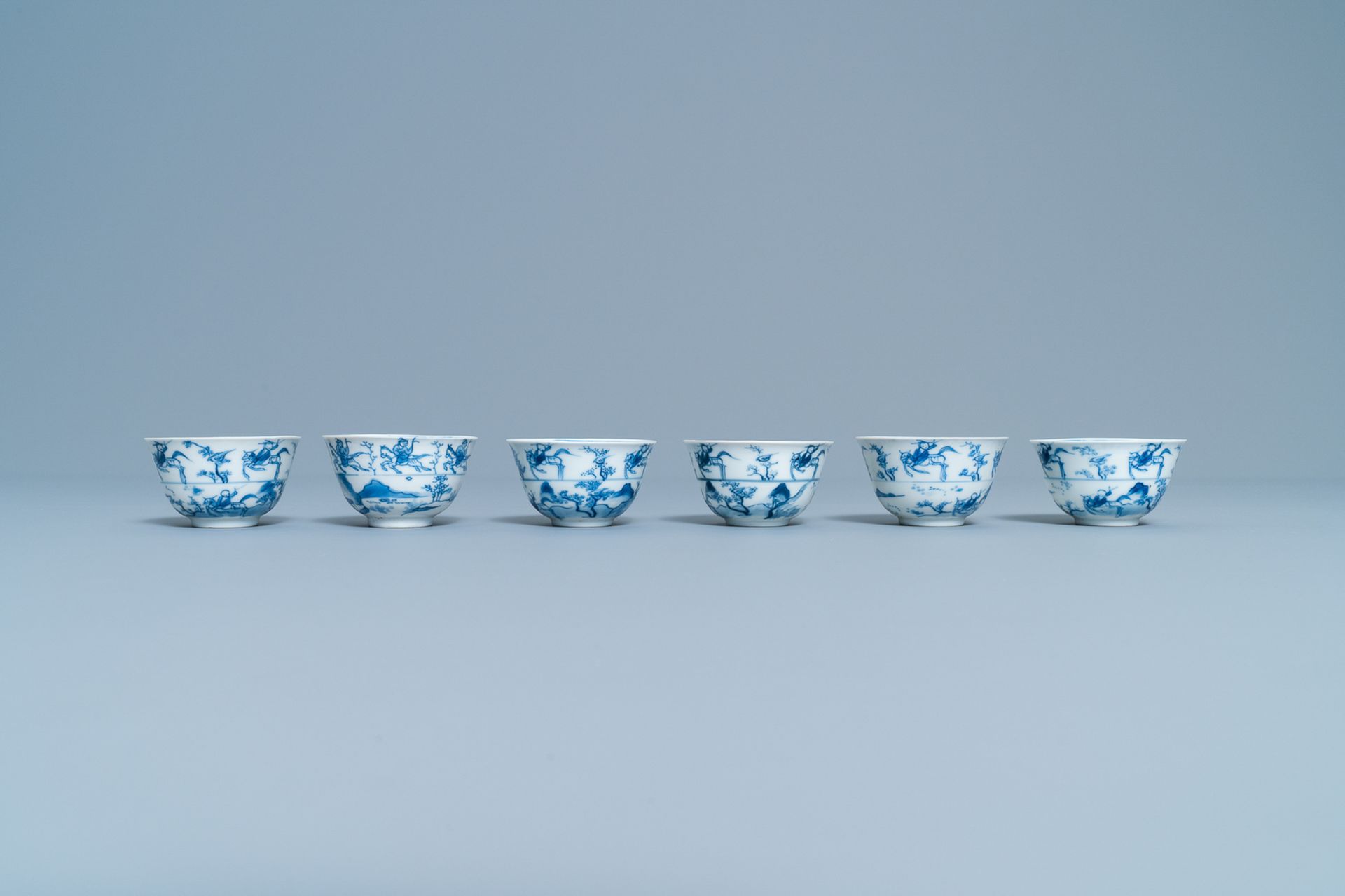 Six Chinese blue and white cups and saucers with horseriders, Kangxi - Image 6 of 10