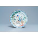 A Chinese famille rose 'Four elements' export porcelain plate depicting 'Earth', Qianlong