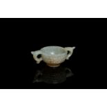 A Chinese celadon jade two-handled libation cup, Ming