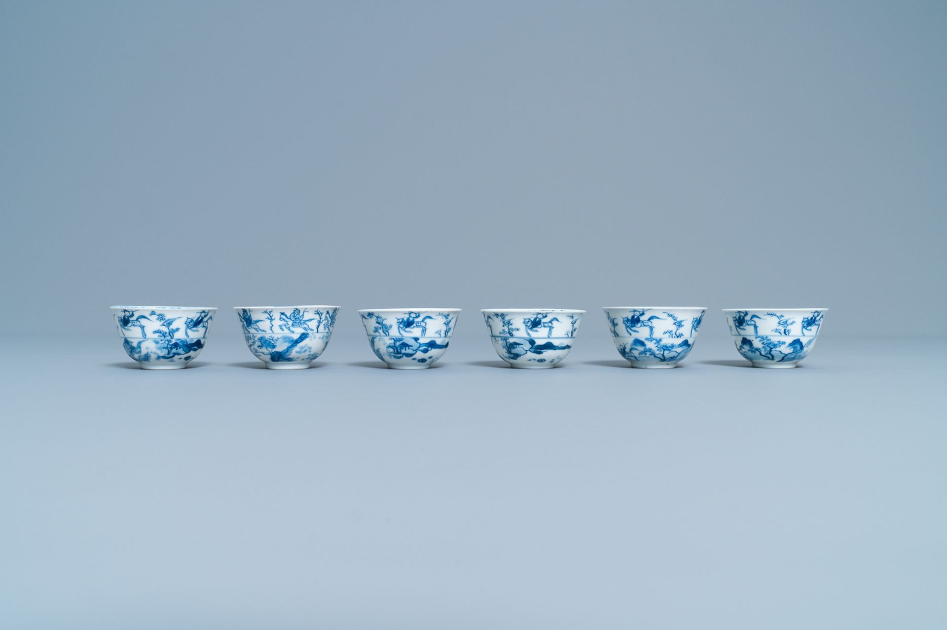 Six Chinese blue and white cups and saucers with horseriders, Kangxi - Image 4 of 10