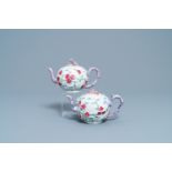 A pair of Chinese famille rose relief-decorated teapots with floral design, Yongzheng