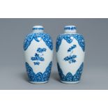 A pair of Chinese blue and white lidded jars with floral design, Kangxi