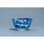 A Chinese blue and white bowl with a lady with cat, Kangxi mark and of the period