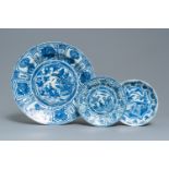 A Chinese blue and white kraak porcelain 'ducks' charger and two plates, Wanli