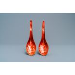 A pair of Chinese reverse-decorated iron red spoons, 19th C.