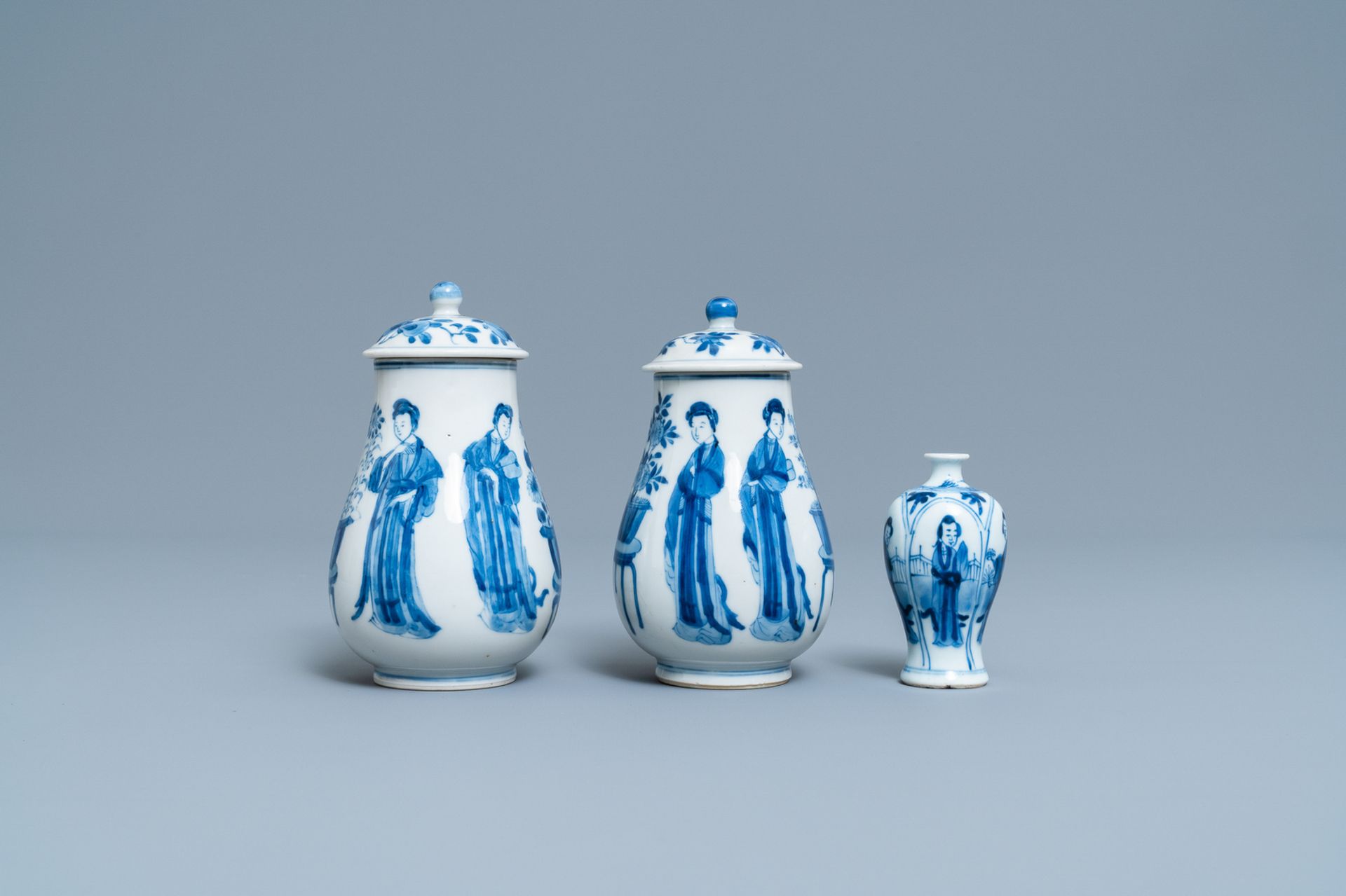 A pair of Chinese blue and white 'Long Eliza' jugs and covers and a miniature vase, Kangxi - Image 3 of 7