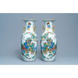 A pair of Chinese famille rose two-sided design vases, 19/20th C.