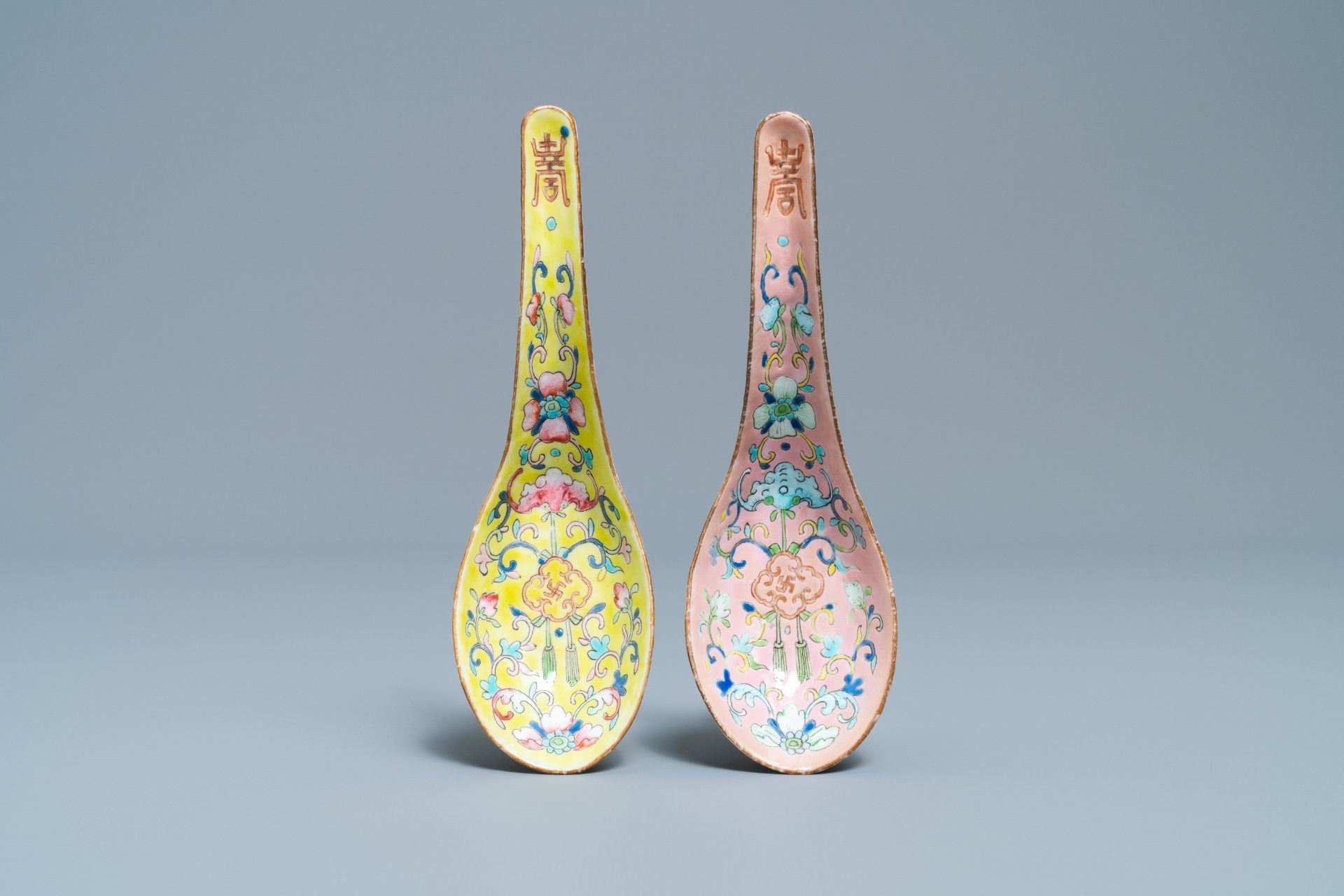 Two Chinese yellow- and pink-ground spoons, Tongzhi mark and of the period