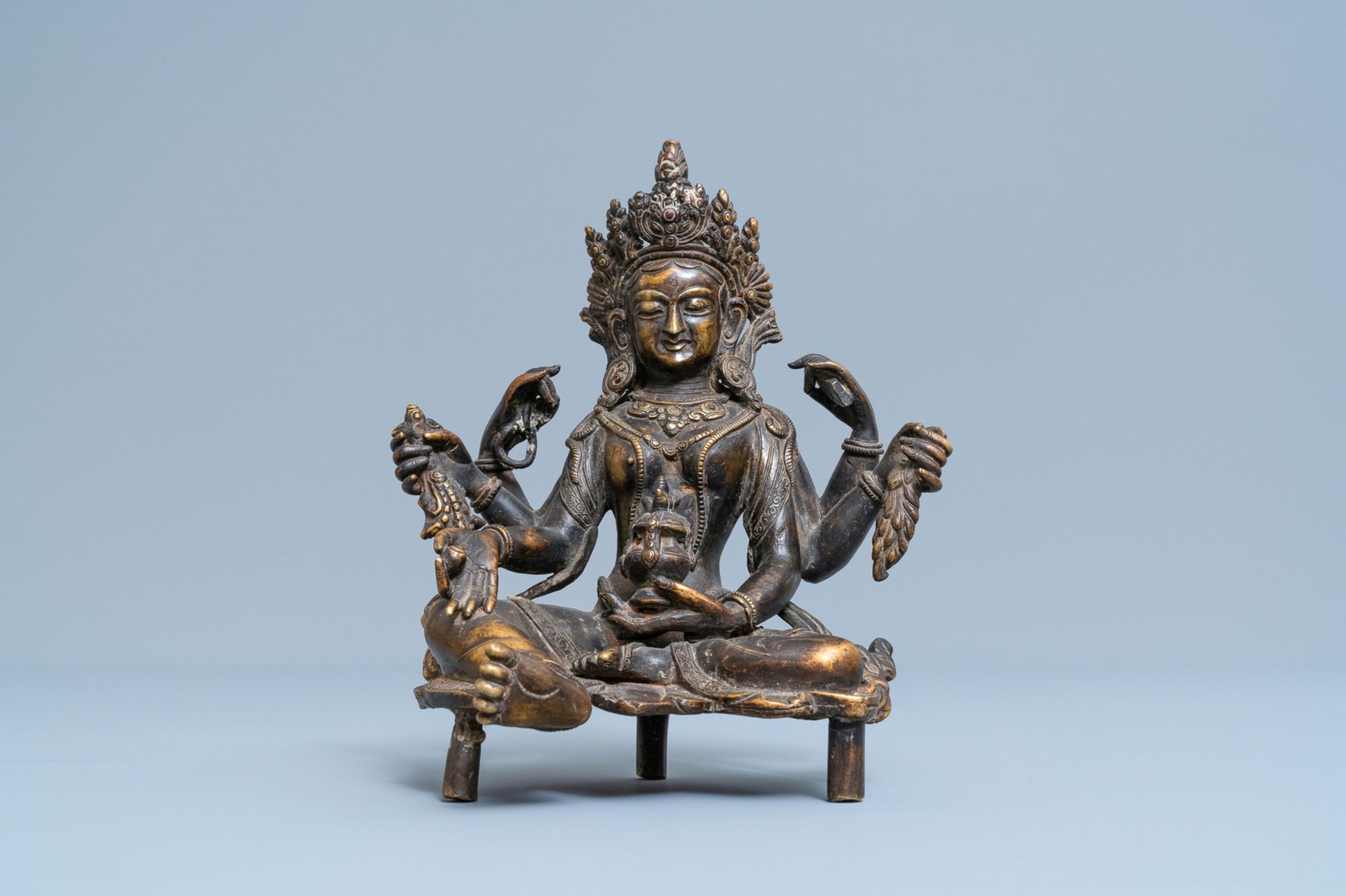 A Nepalese solid bronze figure of Vasudhara, 19th C. - Image 2 of 7