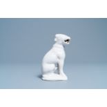 A white Dutch Delft model of a dog, 18th C.