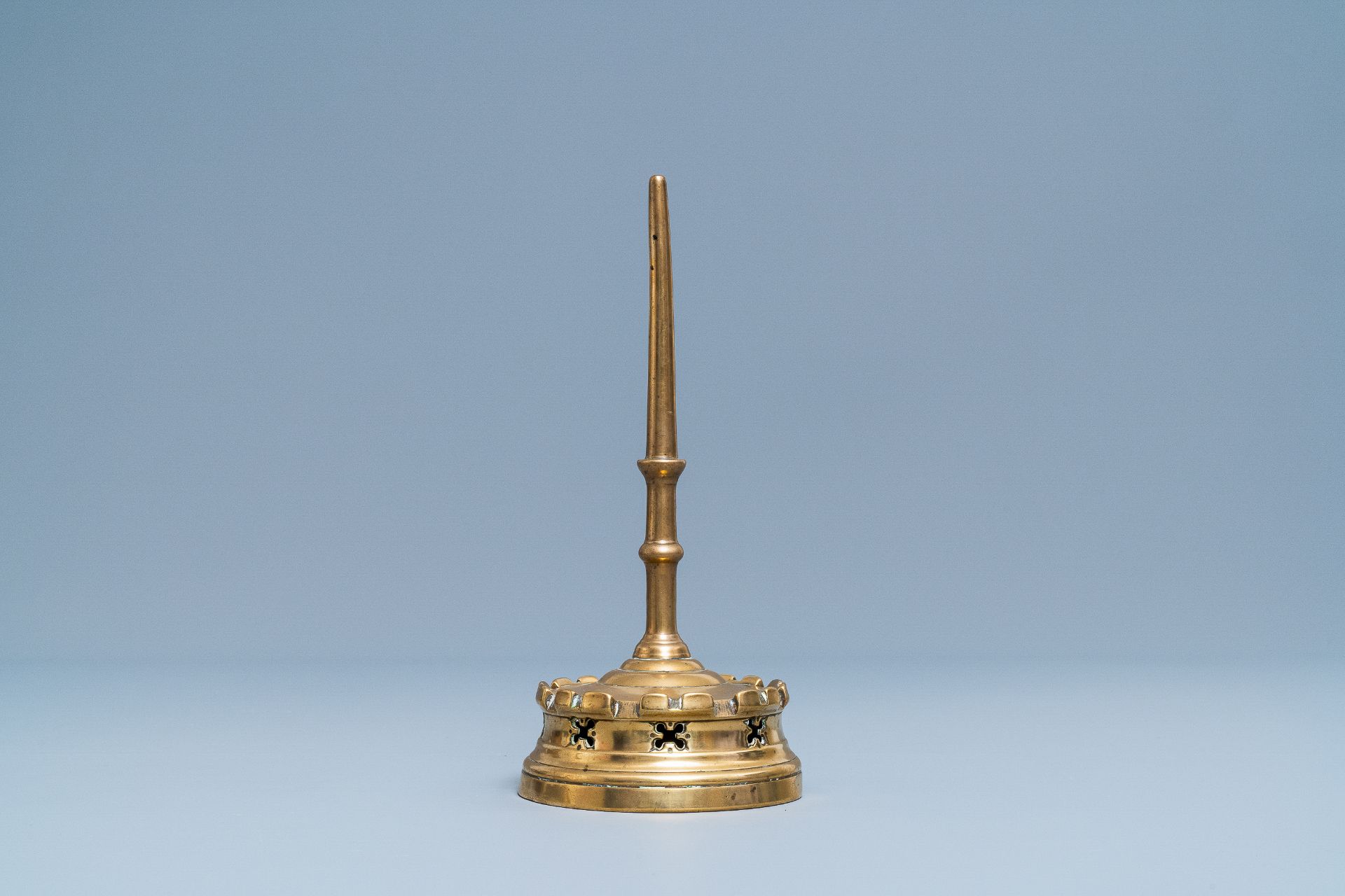 A Flemish or Dutch bronze candlestick, 14/15th C.