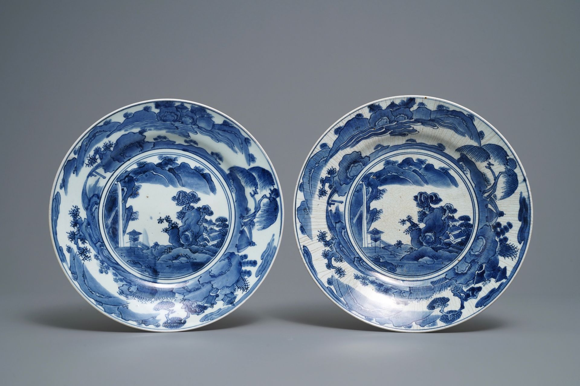 A pair of Japanese blue and white Arita dishes with mountainous landscapes, Arita, Edo, 17/18th C.