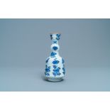 A Chinese blue and white elongated huqqa base with floral design, Kangxi