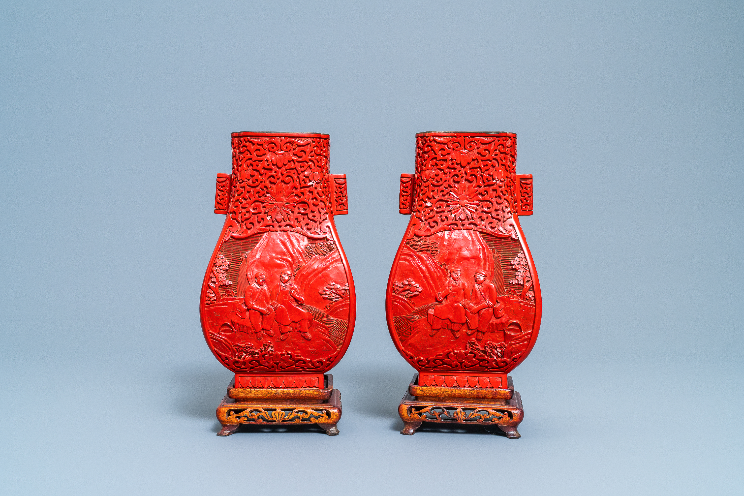 A pair of Chinese cinnabar lacquer 'Cultural Revolution' vases, 20th C.