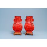 A pair of Chinese cinnabar lacquer 'Cultural Revolution' vases, 20th C.