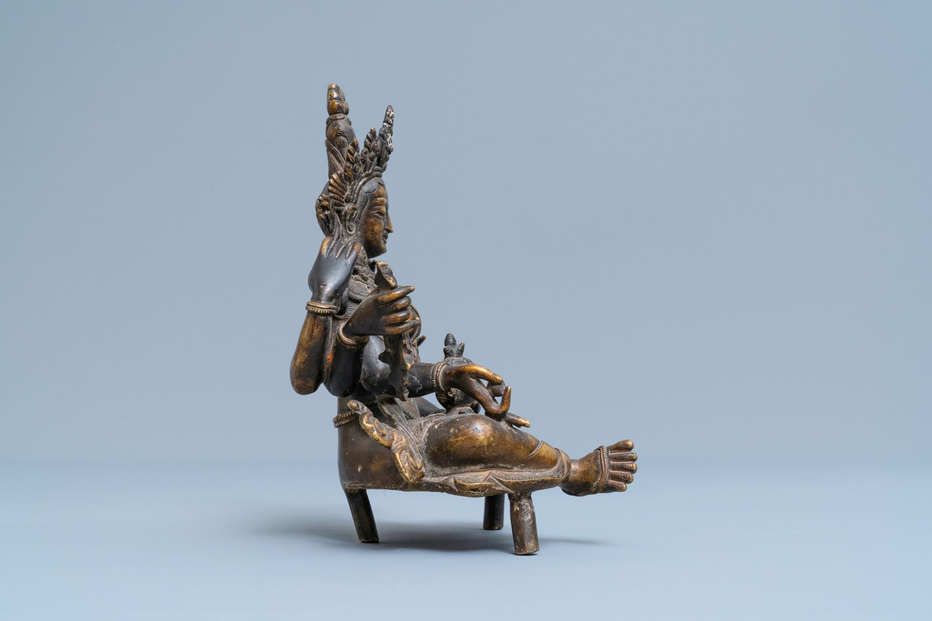 A Nepalese solid bronze figure of Vasudhara, 19th C. - Image 3 of 7