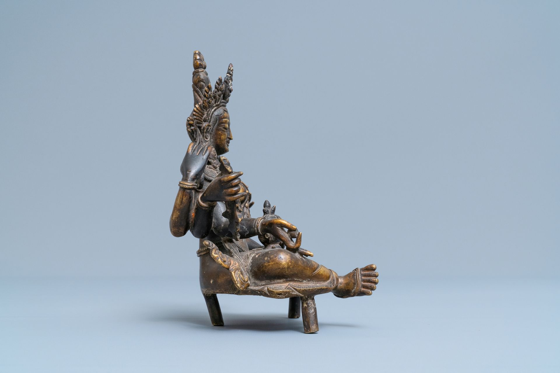 A Nepalese solid bronze figure of Vasudhara, 19th C. - Image 5 of 7