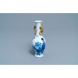 A Chinese blue and white vase with gilt elephant-head handles, Kangxi