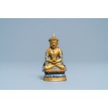 A Chinese gilt and parcel-flambe glazed figure of a Bodhisattva, 19/20th C.