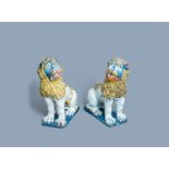 A pair of monumental polychrome Rouen faience models of lions, France, 18th C.