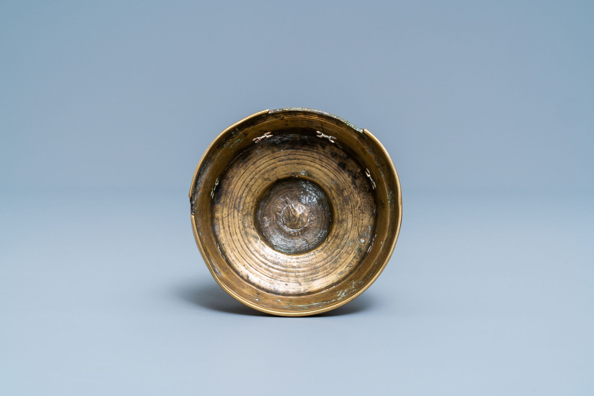 A Flemish or Dutch bronze candlestick, 14/15th C. - Image 6 of 6