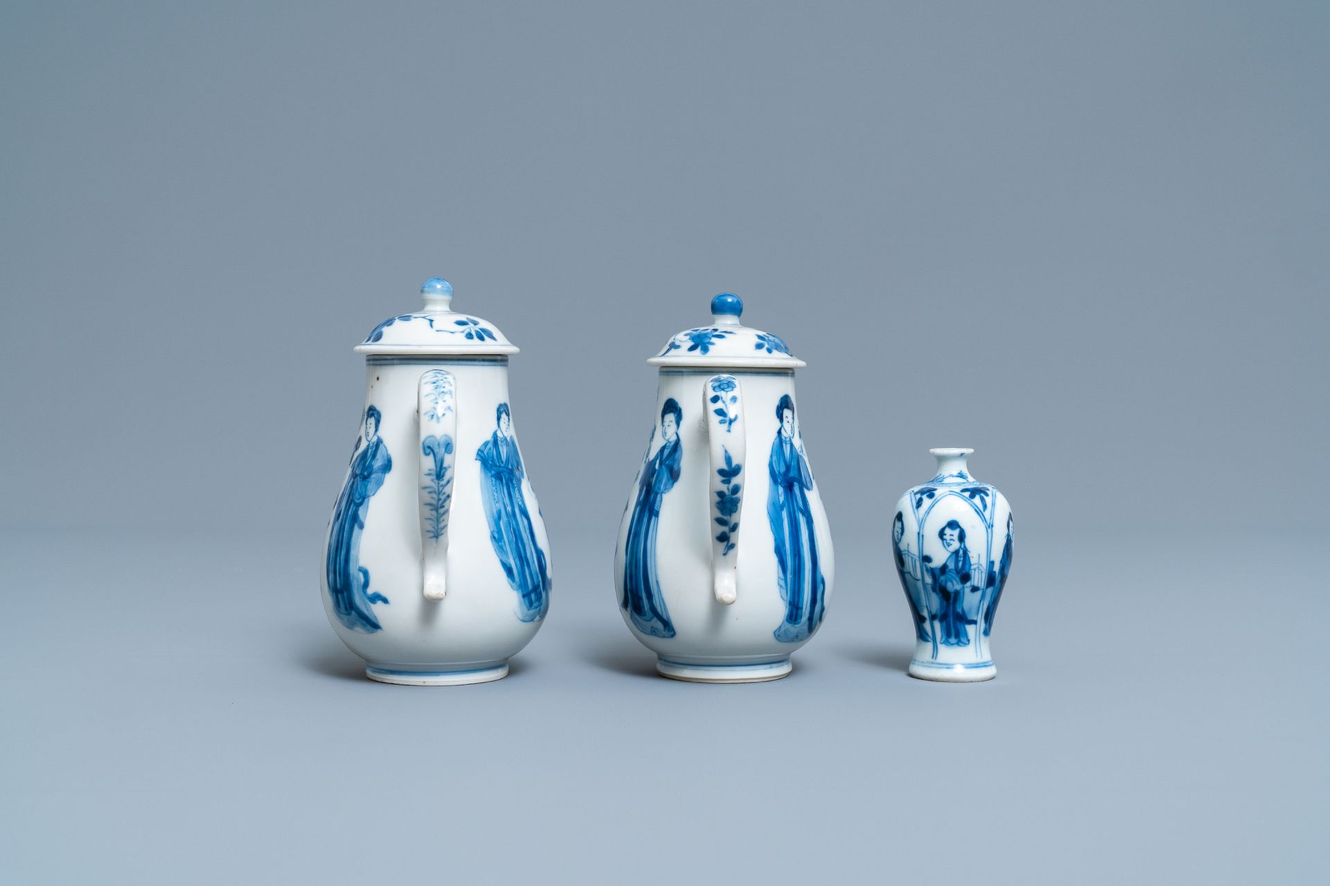 A pair of Chinese blue and white 'Long Eliza' jugs and covers and a miniature vase, Kangxi - Image 5 of 7